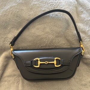 Anthropologie Black Leather Shoulder Bag with Gold Horsebit Detail